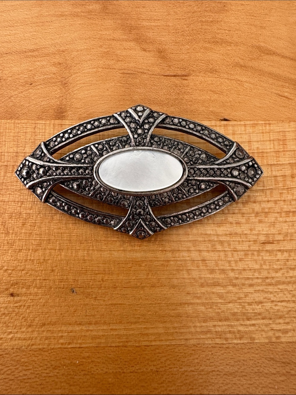 Vintage Silver-Tone Marcasite Brooch with Mother-of-Pearl Center